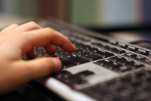 Hand on keyboard