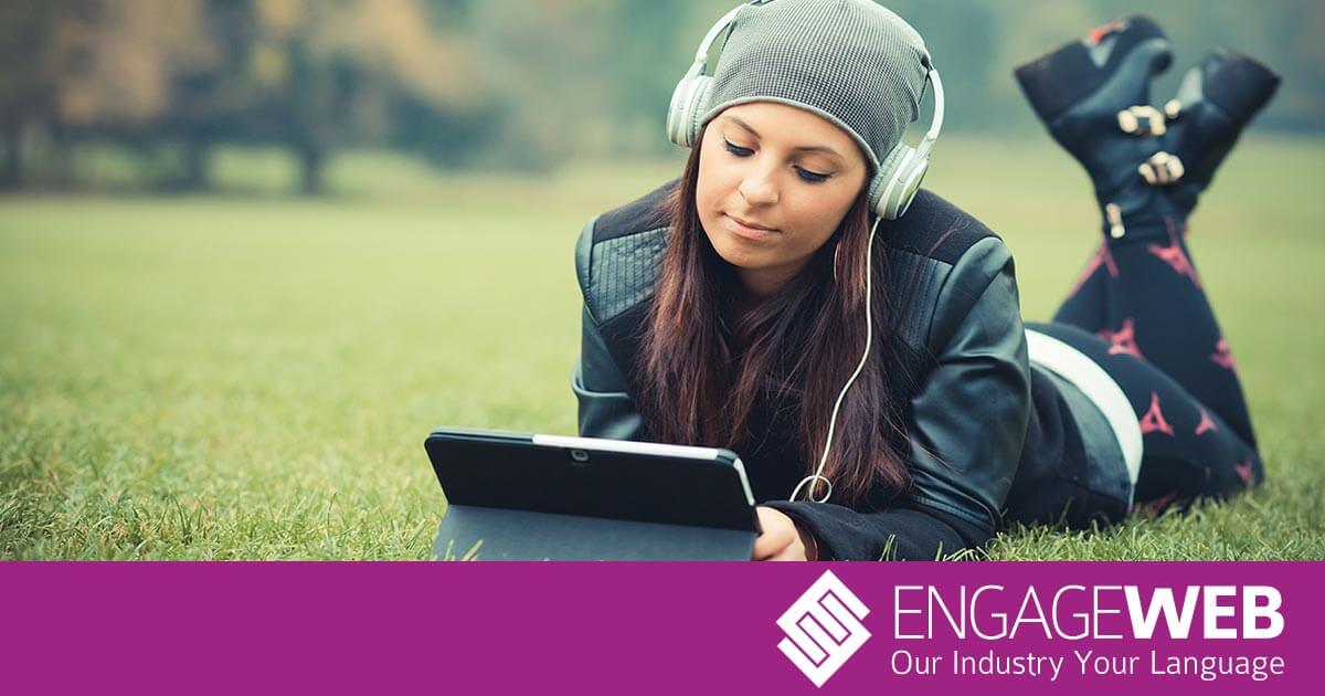 Woman on tablet in field