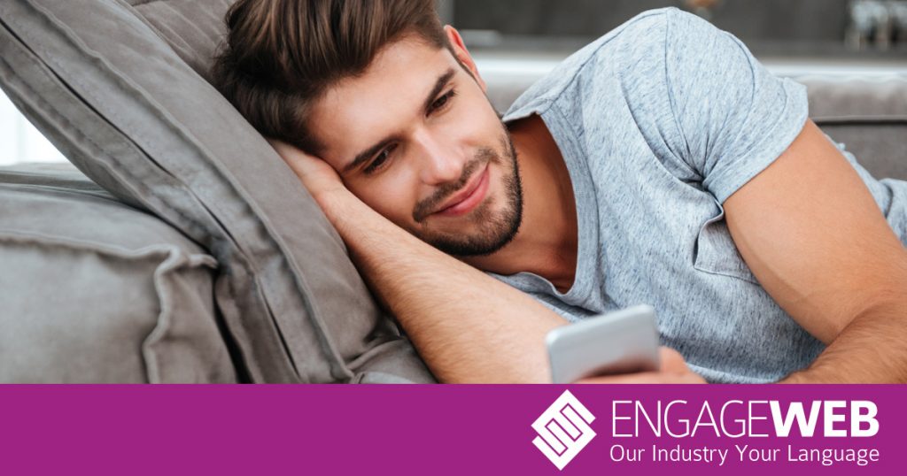 Man lounging on phone