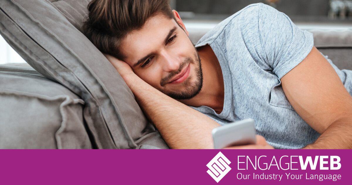 Man lounging on phone