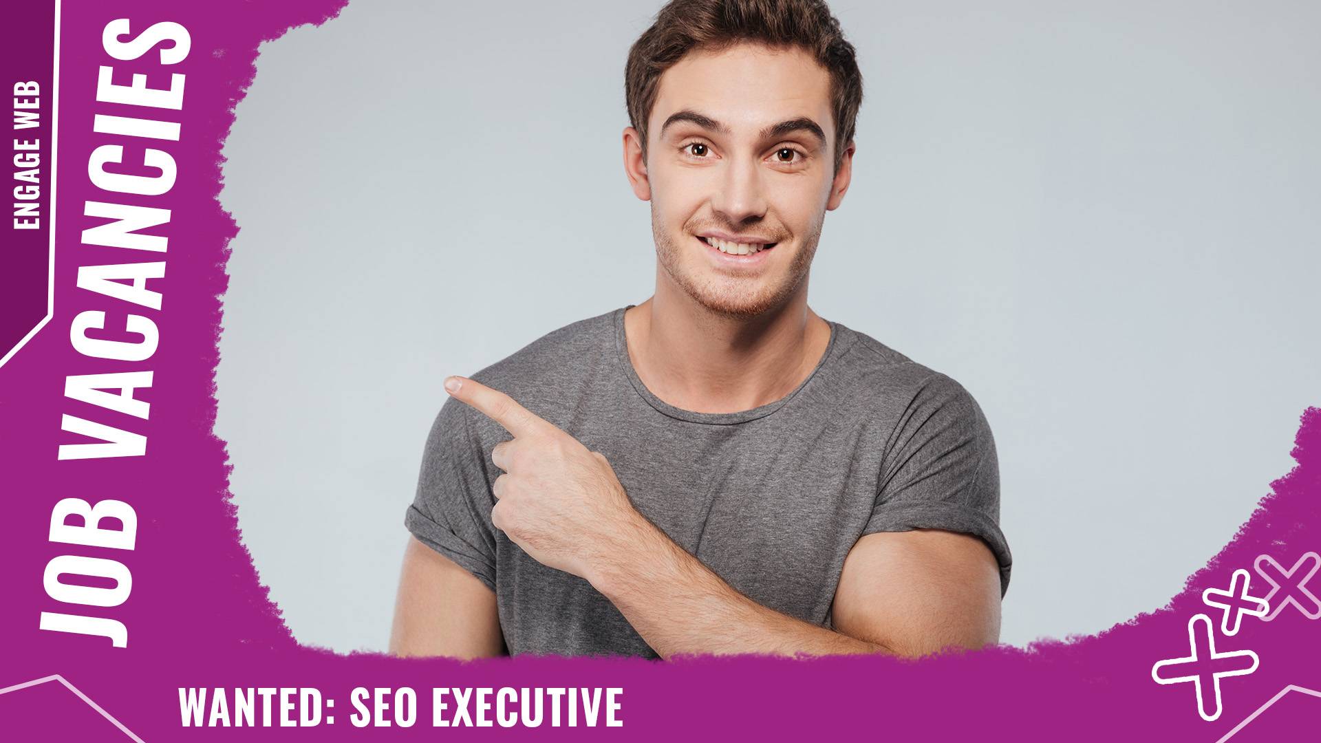 An image of a young man pointing to text that says 'job vacancies'