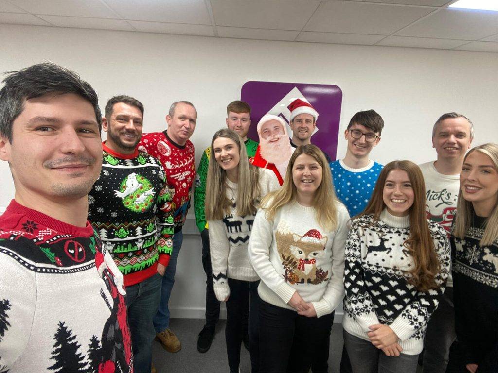 Engage Web staff wearing Christmas jumpers